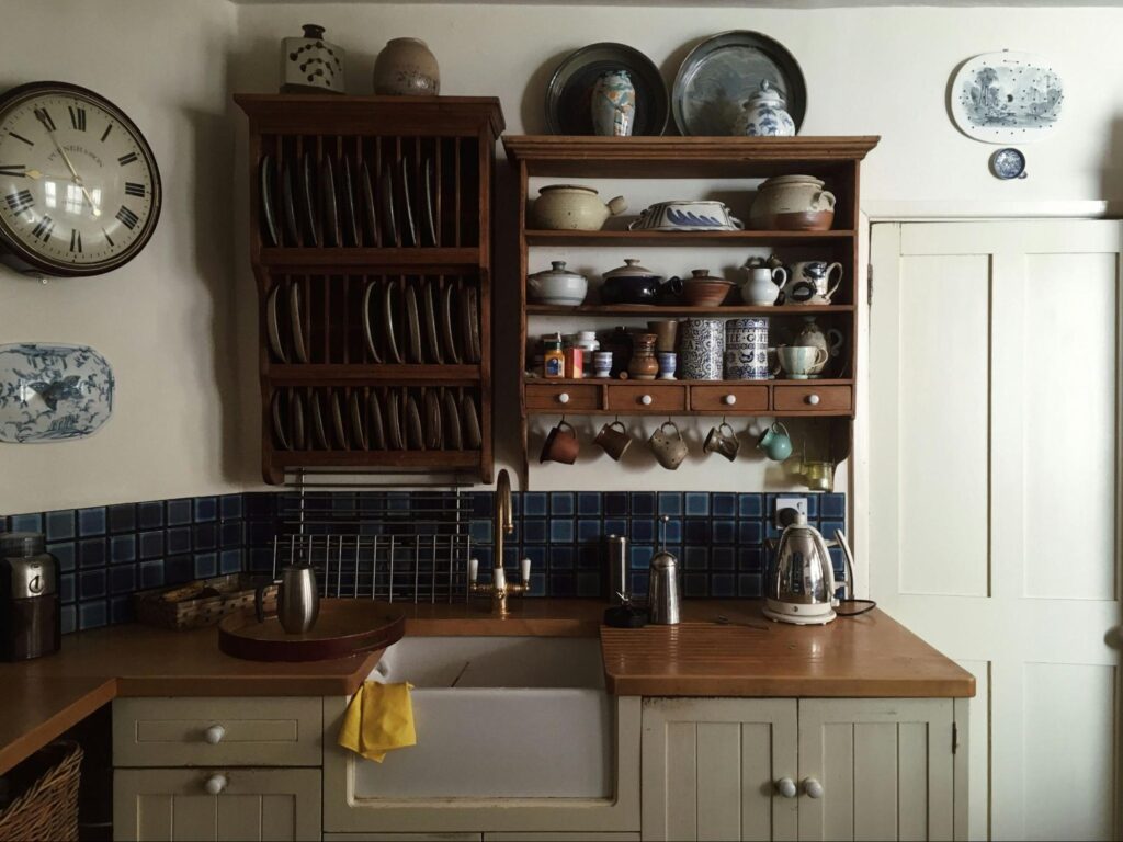 Rustic, traditional kitchen cabinets with vintage open shelving 