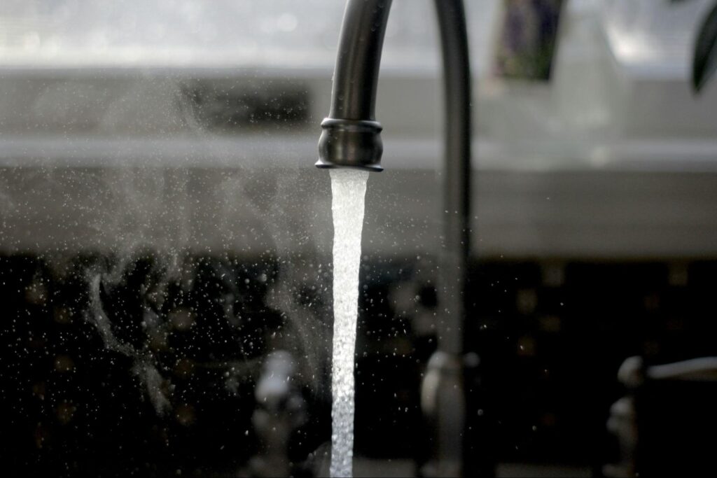 Running water from a faucet