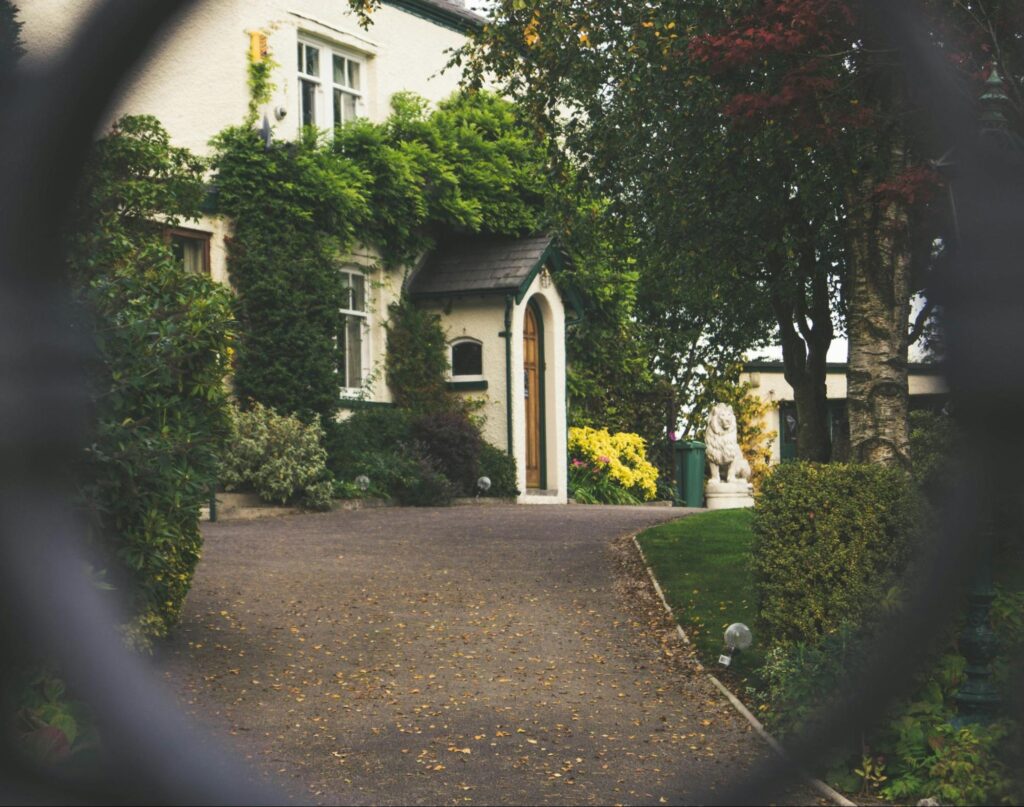 A house exterior covered in plants